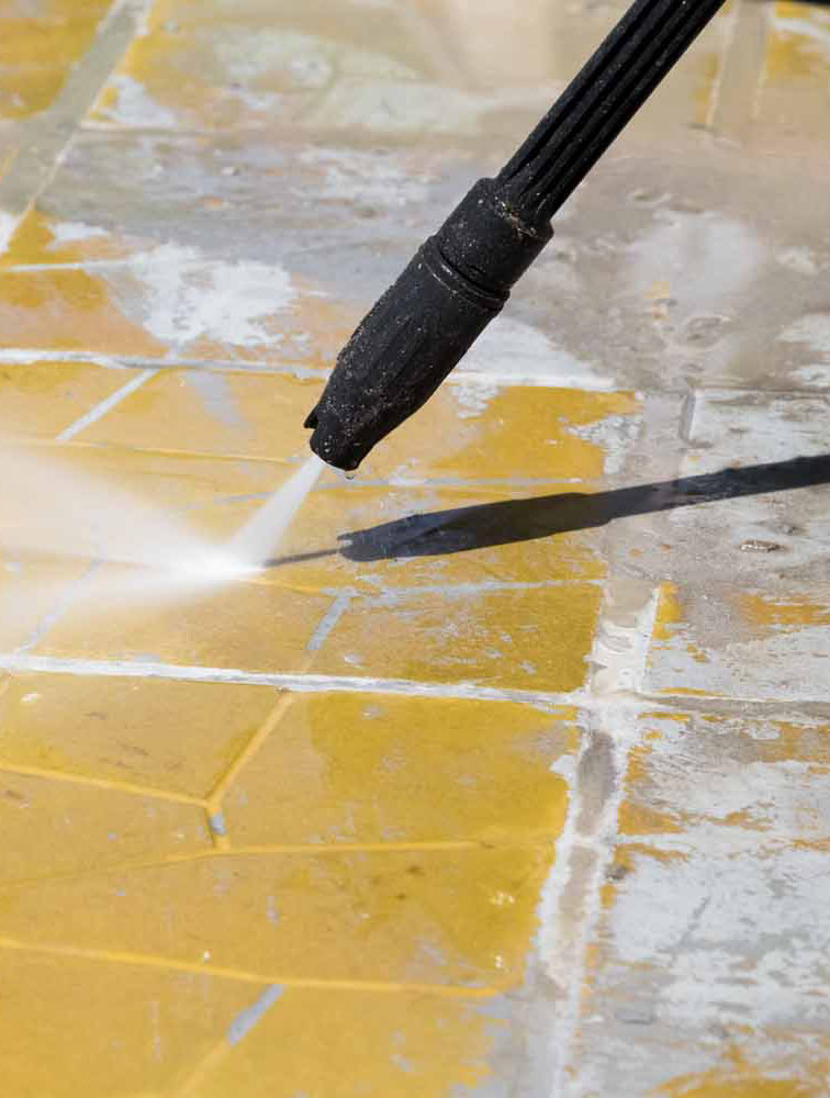 Boom Pressure Washing cleaning tiles